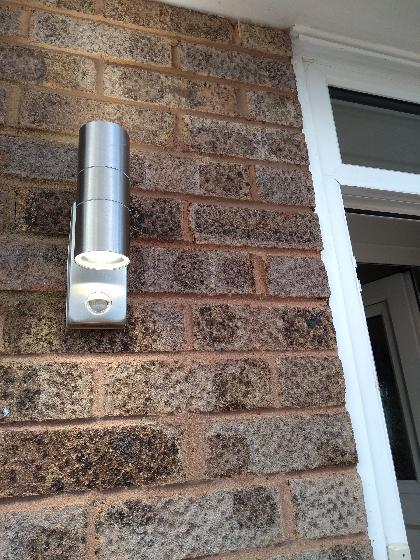 External LED Up/Down light with PIR installed with all wiring installed  internally to avoid seeing any external cable.