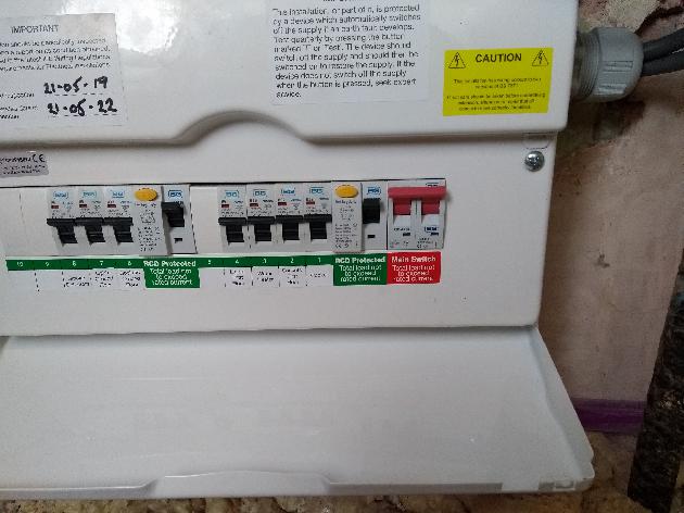 Consumer unit showing the fire rated tails kit as required.