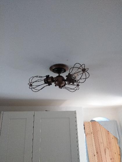 Customer supplied light replaced for kitchen ceiling.