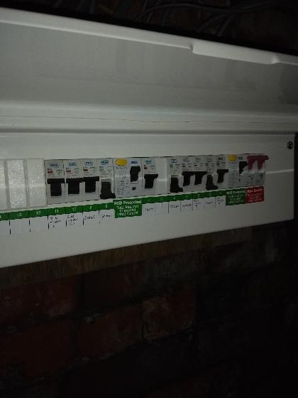 Main consumer unit with new supply tails, new main earth and fully fire rated.