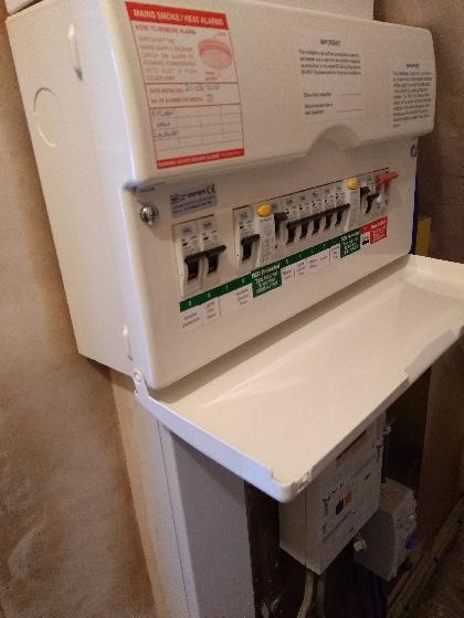 Consumer unit with new meter tails and main earth upgrade.